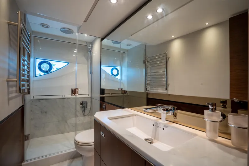 Slide: The Image of Luxurious bathroom on 2023 Princess S66 Sportbridge yacht with modern fixtures and elegant design. - 20