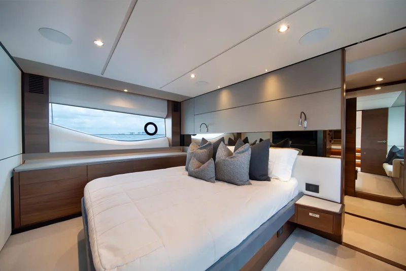 Slide: The Image of Luxurious bedroom interior of 2023 Princess S66 Sportbridge yacht with modern design elements. - 18