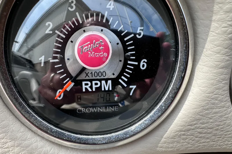 Slide: The Image of Close-up of a 2015 Crownline 21 SS tachometer showing RPM gauge. - 16