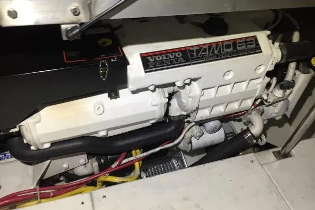 Slide: The Image of Volvo Penta engine in a 2004 Carver 420 Mariner yacht, showcasing mechanical components. - 23