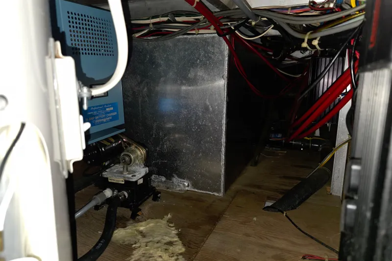 Slide: The Image of Electrical wiring and battery charger inside 1988 Marinette 37 Motor Yacht. - 28