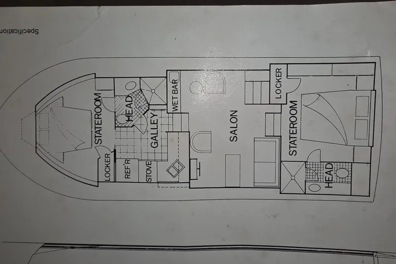 Slide: The Image of Floor plan of a 1988 Marinette 37 Motor Yacht, featuring staterooms, salon, galley, and heads. - 54