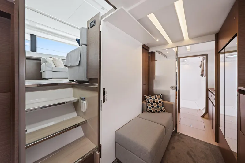 Slide: The Image of Luxurious interior of 2025 Leopard 53 Powercat yacht, featuring modern seating and elegant design. - 21