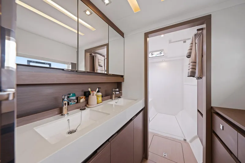 Slide: The Image of Luxurious bathroom interior of 2025 Leopard 53 Powercat yacht with dual sinks and modern design. - 22