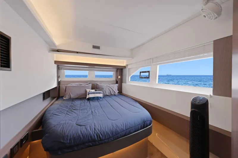 Slide: The Image of Luxurious bedroom interior of 2025 Leopard 53 Powercat yacht with ocean view. - 32