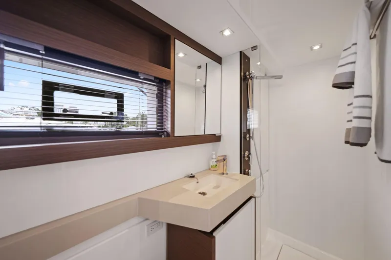 Slide: The Image of Modern bathroom interior on 2025 Leopard 53 Powercat yacht, featuring sleek design and fixtures. - 34