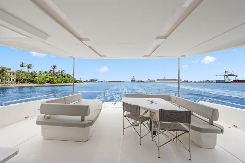 Slide: The Image of Spacious deck of 2025 Leopard 53 Powercat yacht with ocean view and seating area. - 35