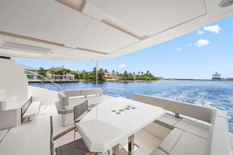 Slide: The Image of Luxurious Leopard 53 Powercat 2025 yacht with spacious deck, scenic waterfront view. - 37