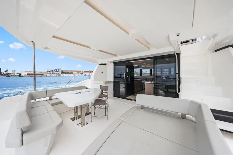 Slide: The Image of Luxurious 2025 Leopard 53 Powercat yacht with spacious outdoor seating and ocean view. - 40