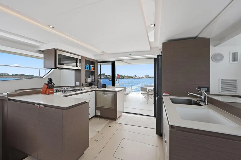 Slide: The Image of Luxurious kitchen interior of 2025 Leopard 53 Powercat yacht with ocean view. - 49