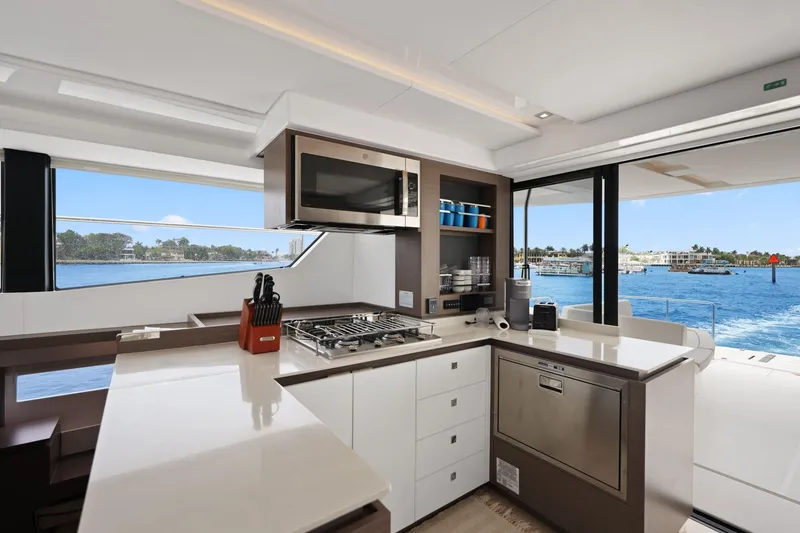 Slide: The Image of Modern kitchen interior on 2025 Leopard 53 Powercat yacht with ocean view. - 50