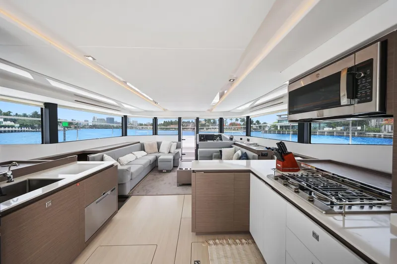 Slide: The Image of Luxurious interior of 2025 Leopard 53 Powercat yacht with modern kitchen and spacious seating area. - 52