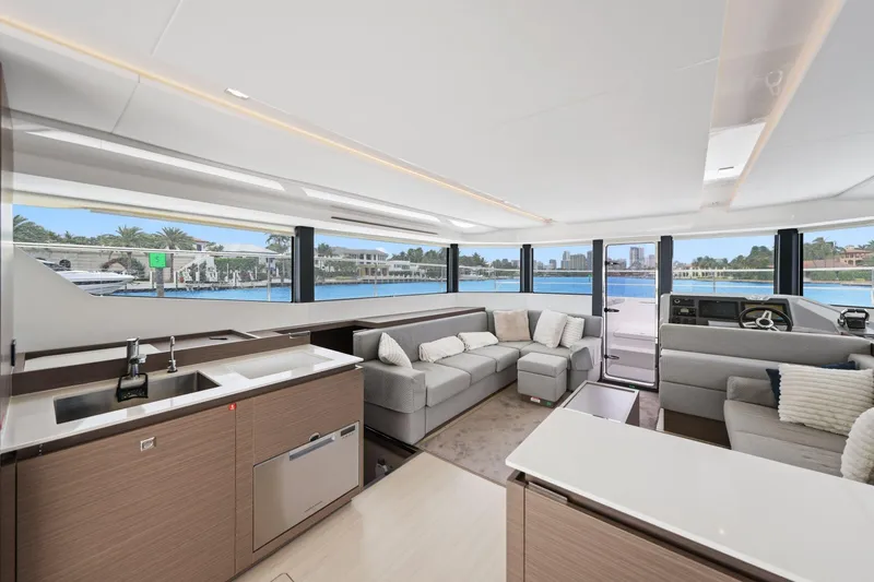 Slide: The Image of Luxurious interior of 2025 Leopard 53 Powercat yacht with modern furnishings and panoramic windows. - 53