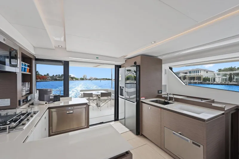Slide: The Image of Modern kitchen interior on 2025 Leopard 53 Powercat yacht with scenic water views. - 58