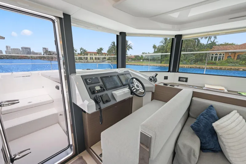 Slide: The Image of Interior view of 2025 Leopard 53 Powercat yacht with modern helm and seating area. - 59