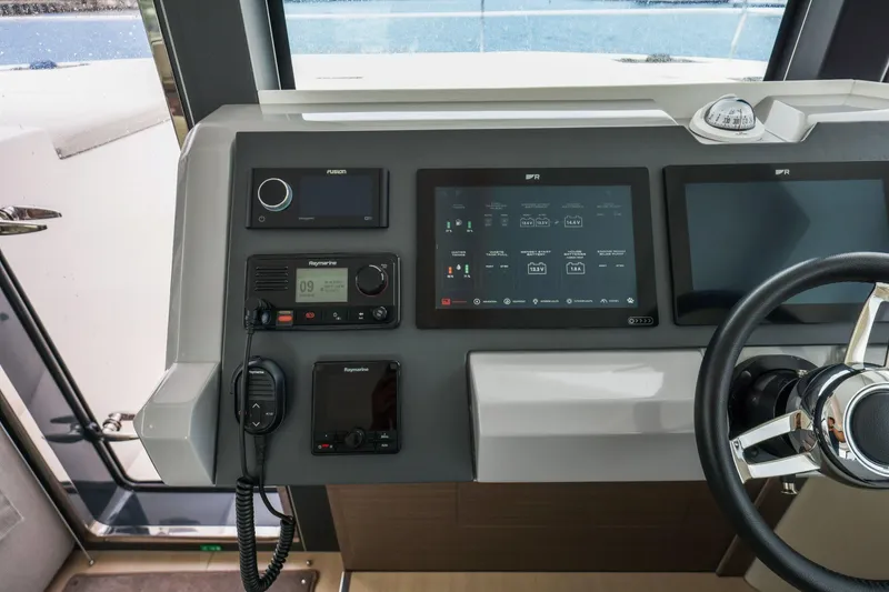 Slide: The Image of 2025 Leopard 53 Powercat helm with advanced navigation and control systems. - 61