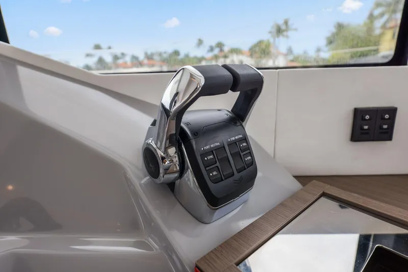 Slide: The Image of Throttle controls on the 2025 Leopard 53 Powercat yacht dashboard. - 63