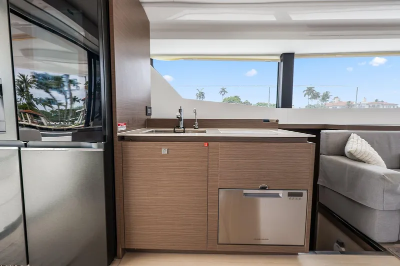 Slide: The Image of Modern kitchen area on 2025 Leopard 53 Powercat yacht with sleek cabinetry and appliances. - 66