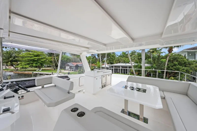 Slide: The Image of Luxurious interior of 2025 Leopard 53 Powercat yacht with modern seating and scenic views. - 75