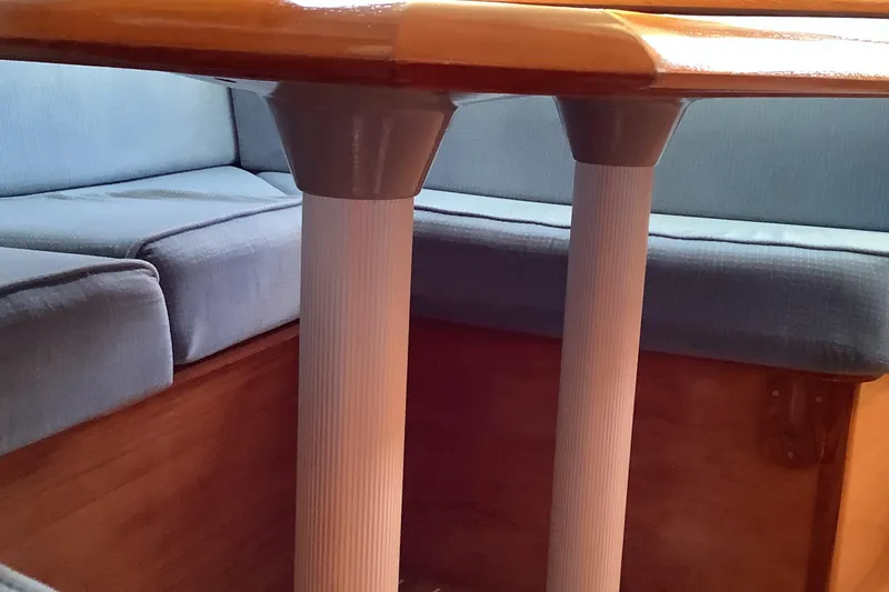Slide: The Image of Interior seating area of a 1997 Jeanneau Sun Odyssey 36.2 sailboat. - 12