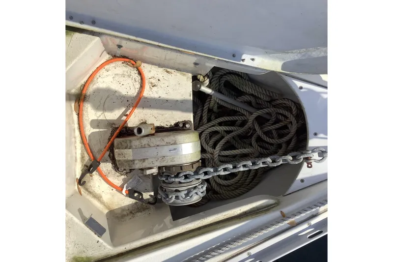 Slide: The Image of Anchor locker of 1997 Jeanneau Sun Odyssey 36.2 with chain and rope. - 22
