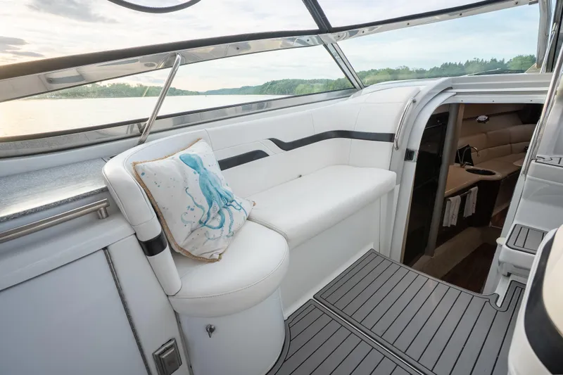 Slide: The Image of Interior of a 2006 Formula 400 Super Sport yacht with elegant seating and nautical decor. - 18