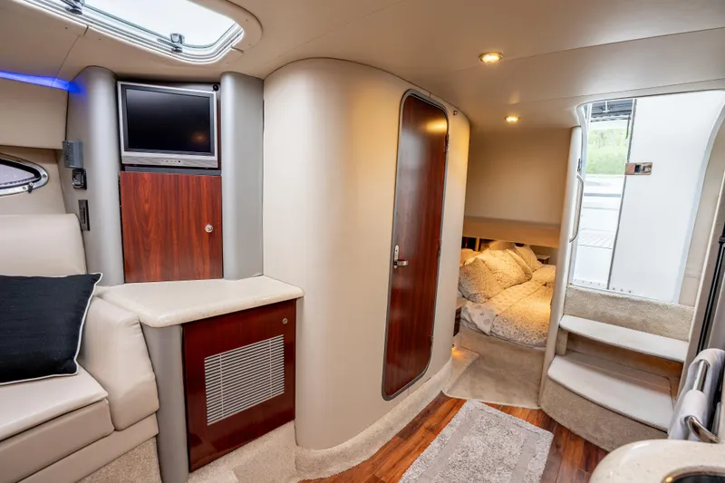 Slide: The Image of Luxurious interior of a 2006 Formula 400 Super Sport yacht with cozy seating and elegant decor. - 23