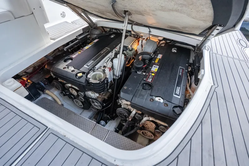 Slide: The Image of Engine compartment of a 2006 Formula 400 Super Sport boat, showcasing dual engines. - 26