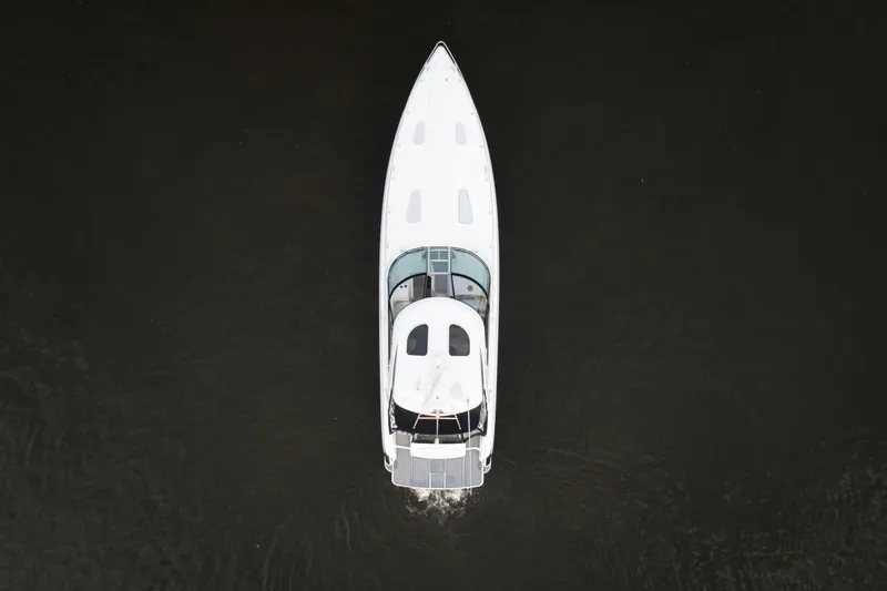 Slide: The Image of Aerial view of 2006 Formula 400 Super Sport boat on dark water. - 9