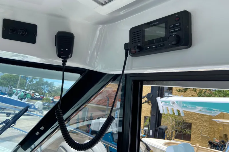 Slide: The Image of Interior of 2024 Jeanneau NC Weekender 895 Series 2 with Garmin marine radio. - 20
