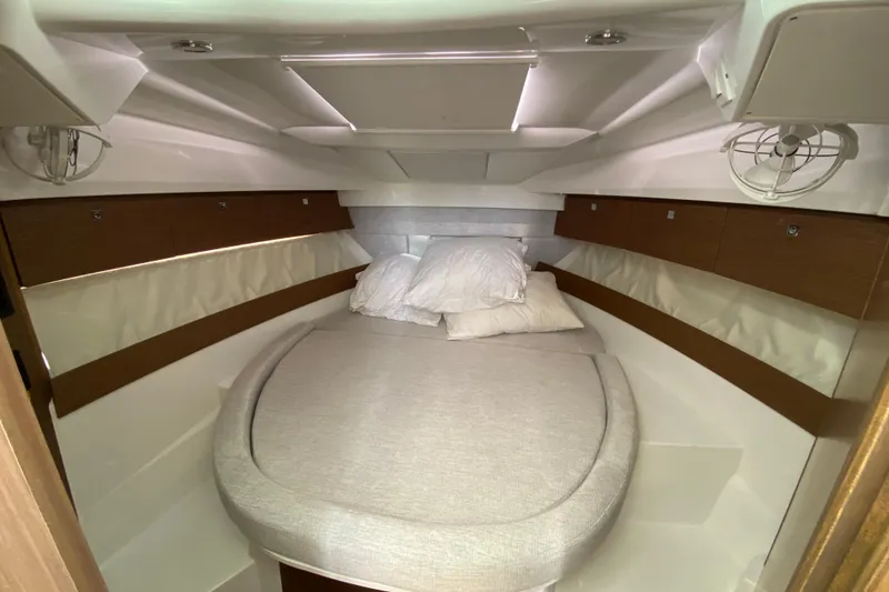 Slide: The Image of 2024 Jeanneau NC Weekender 895 Series 2 cabin with cozy bed and modern design. - 35