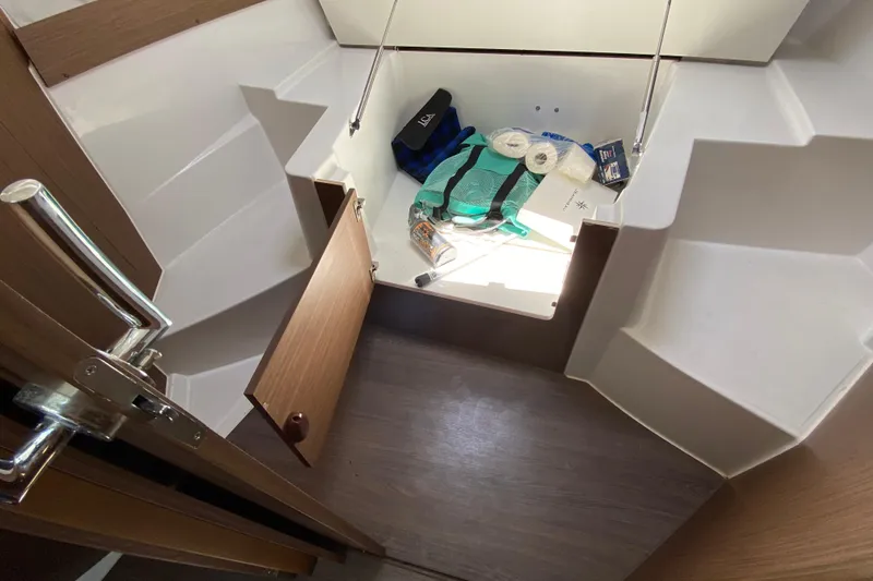 Slide: The Image of Interior storage compartment of 2024 Jeanneau NC Weekender 895 Series 2 boat. - 37