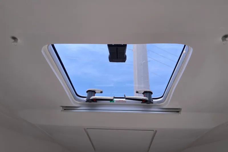 Slide: The Image of Skylight view from 2024 Jeanneau NC Weekender 895 Series 2 boat interior. - 39