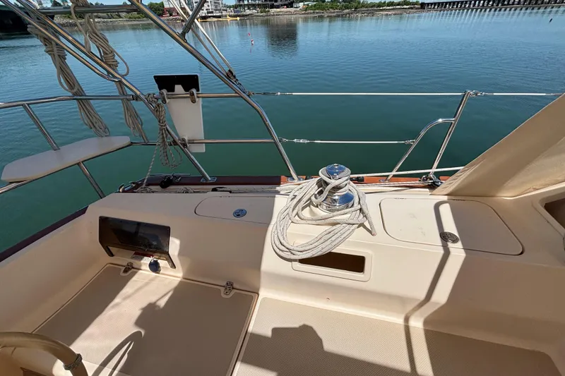 Slide: The Image of Cockpit view of 2015 Island Packet 370 sailboat with winch and ropes. - 21