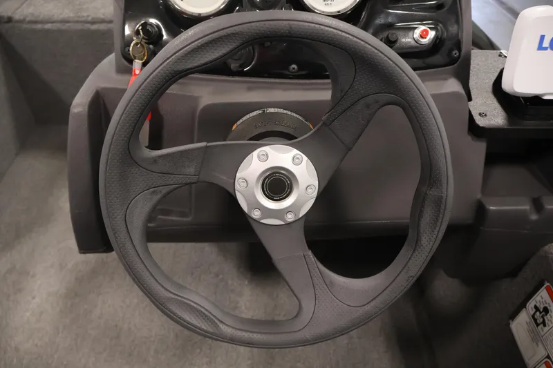 Slide: The Image of Steering wheel of 2024 Tracker Pro 170 boat, featuring a sleek black design. - 22