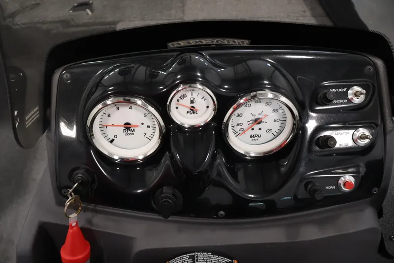 Slide: The Image of Dashboard of 2024 Tracker Pro 170 boat with gauges and switches. - 23