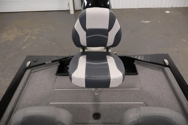 Slide: The Image of 2024 Tracker Pro 170 boat interior with gray and white seating. - 30