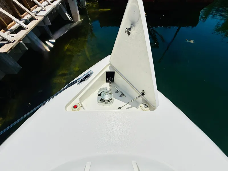 Slide: The Image of Bow of a 2003 Intrepid 377 boat with open anchor hatch. - 11