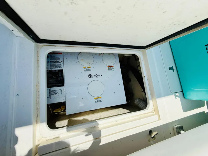 Slide: The Image of 2003 Intrepid 377 boat compartment with equipment and storage space. - 38