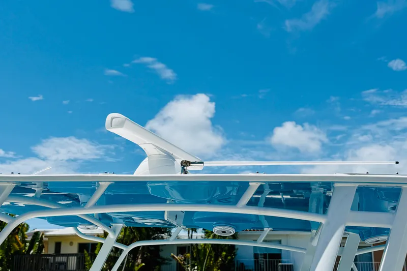 Slide: The Image of 2003 Intrepid 377 boat radar against a clear blue sky. - 73