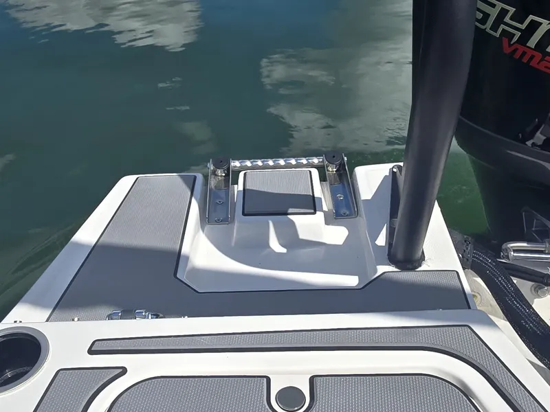 Slide: The Image of The image shows the stern of a 2027 Starcraft 181SVOB boat with a swim platform. - 8