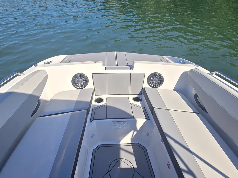 Slide: The Image of The image shows the bow of a 2027 Starcraft 181SVOB boat with seating and speakers. - 20