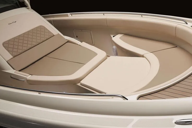 Slide: The Image of Manufacturer Provided Image: 2018 Chris-Craft Catalina 34 boat interior with beige cushioned seating. - 2