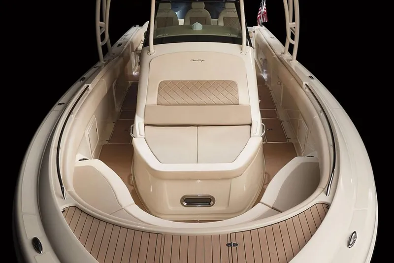 Slide: The Image of Manufacturer Provided Image: 2018 Chris-Craft Catalina 34 boat interior with luxurious seating and teak flooring. - 3