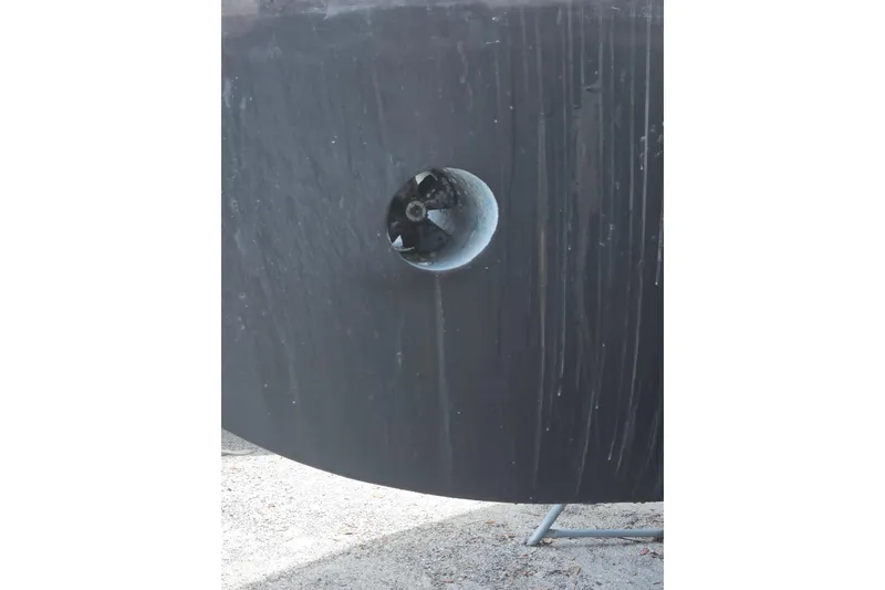 Slide: The Image of Close-up of 1991 Offshore Yachts 48 Yachtfisher hull with visible thruster. - 13