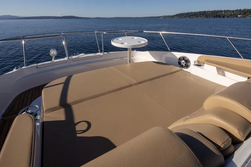 Slide: The Image of Luxurious deck of 2020 Sea Ray Sundancer 320 Coupe on serene water. - 35