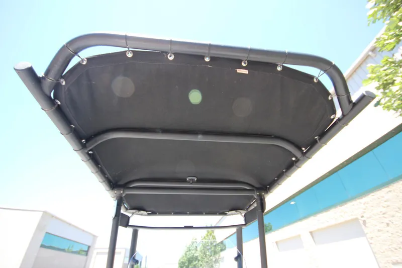Slide: The Image of Zodiac Open 6.5 boat canopy, 2020 model, viewed from below on a sunny day. - 14