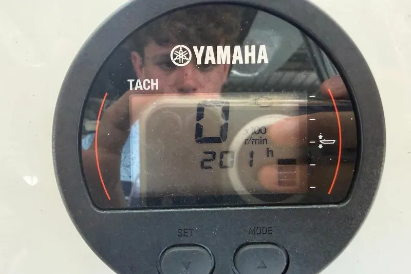 Slide: The Image of Yamaha tachometer display on 2024 Key West 219 FS boat, showing 201 hours. - 10