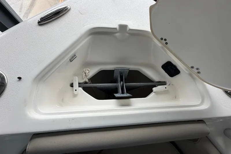 Slide: The Image of Anchor storage compartment on 2024 Key West 219 FS boat. - 16