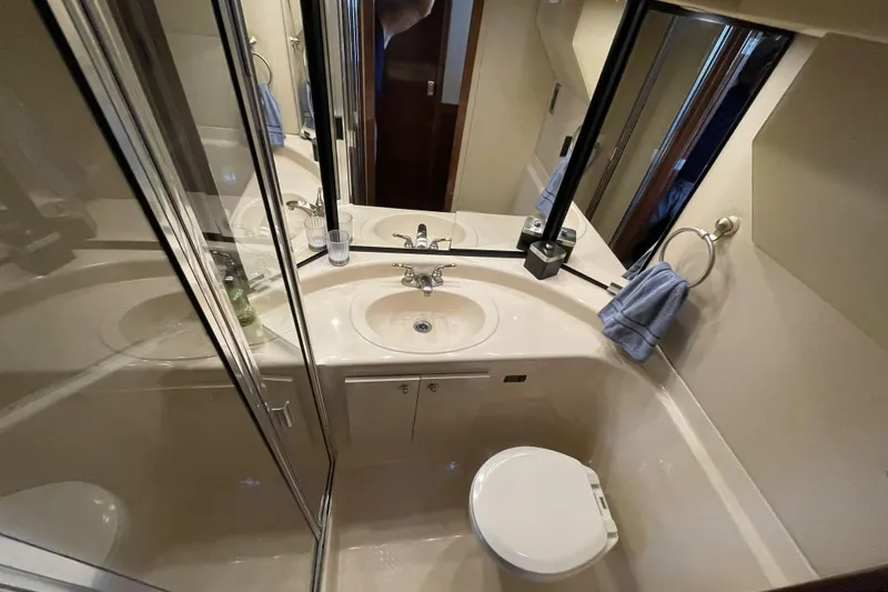 Slide: The Image of Bathroom interior of 2008 Meridian 490 Pilothouse yacht, featuring sink and toilet. - 17